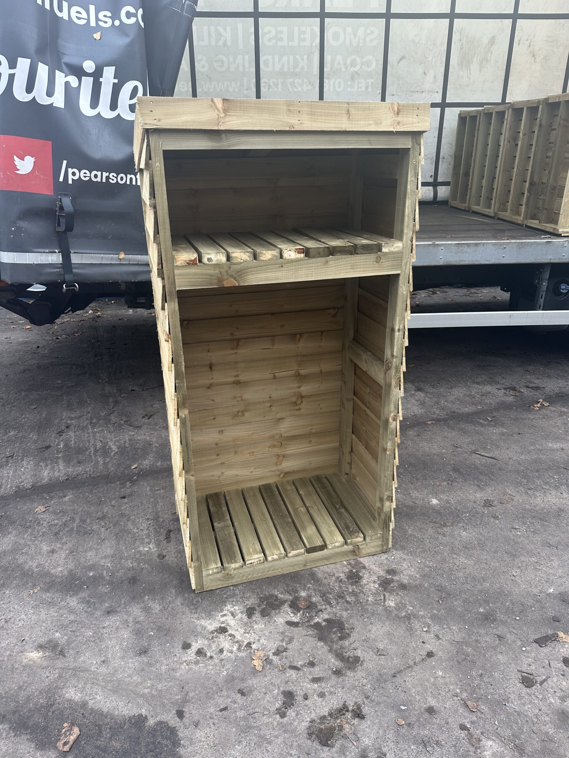 tall-log-store-with-shelf-pearson-fuels-pearson-fuels